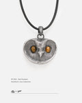 Front view of 925 sterling silver owl pendant with natural tiger's eye stone eyes on white background, by Dzoo, at Rainbow Tears.