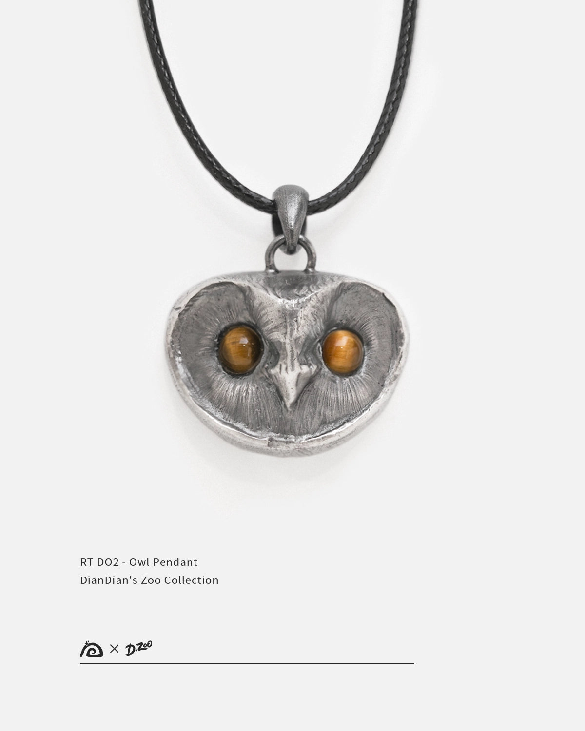 Front view of 925 sterling silver owl pendant with natural tiger's eye stone eyes on white background, by Dzoo, at Rainbow Tears.