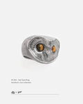 Hand-sculpted 925 sterling silver owl ring with natural tiger eye gemstone eyes, by Dzoo, available at Rainbow Tears.