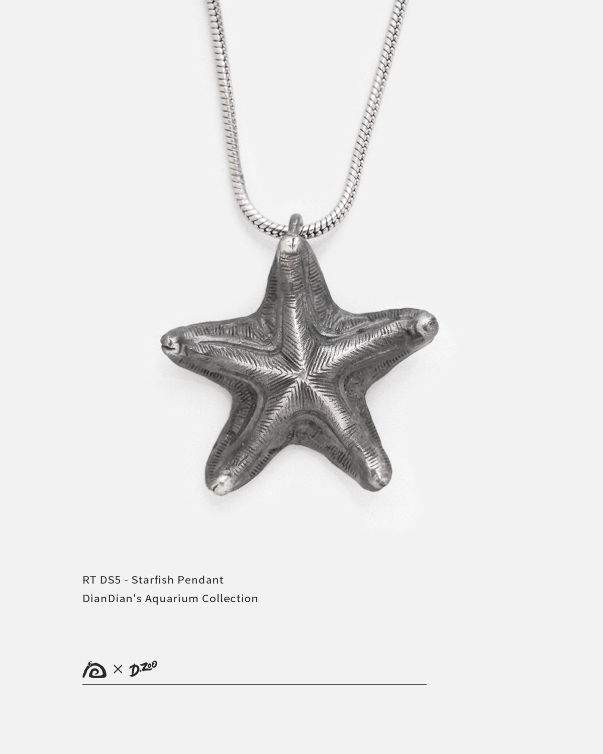 Front view of a distressed handcrafted silver starfish necklace designed by Dzoo, available at Rainbow Tears.