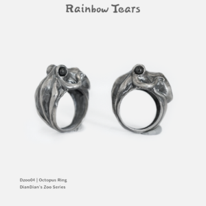 Sterling silver octopus ring shown from side and 45-degree angles, highlighting sculpted tentacle details