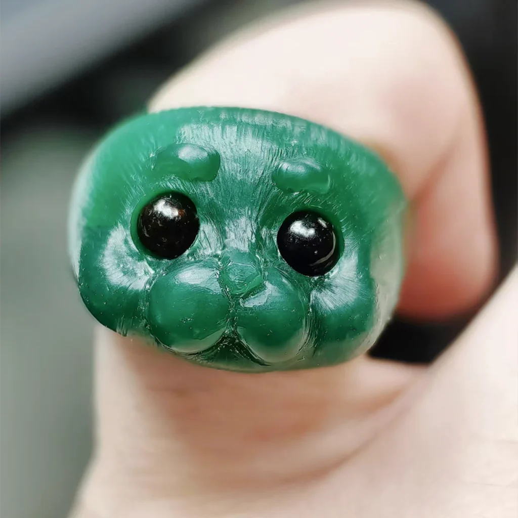 Finished wax model of Ploop seal ring before sterling silver casting