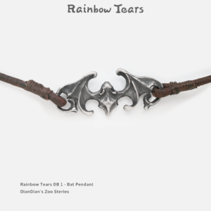 Front view of a sterling silver bat pendant on a white background