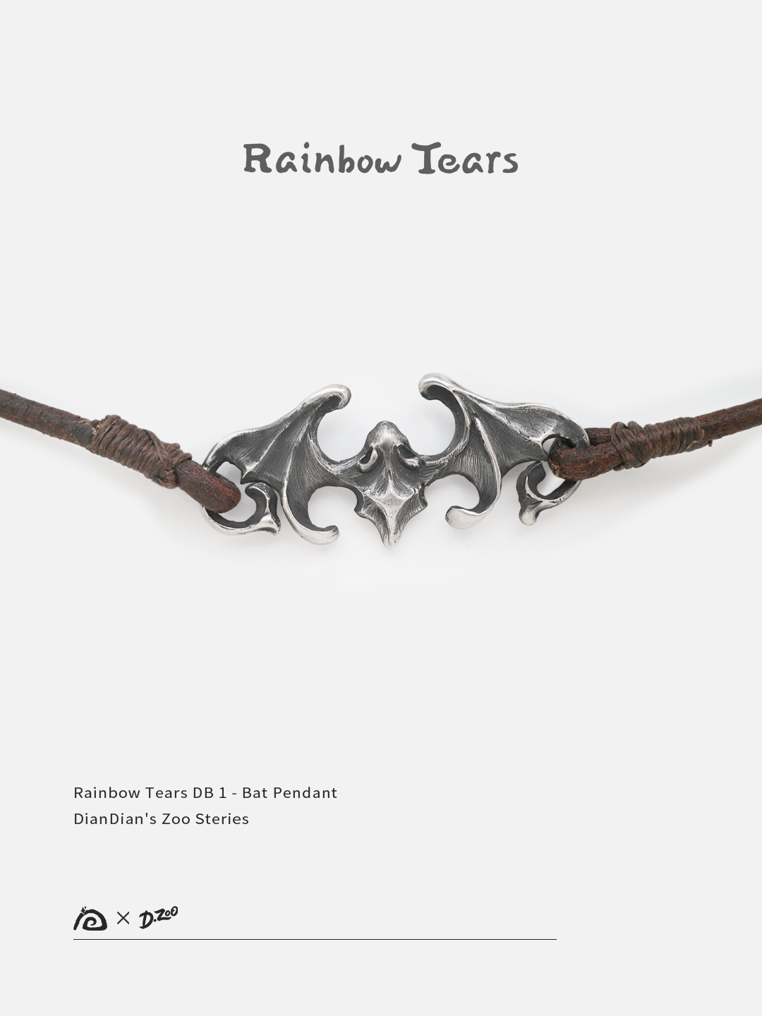 Front view of a sterling silver bat pendant on a white background