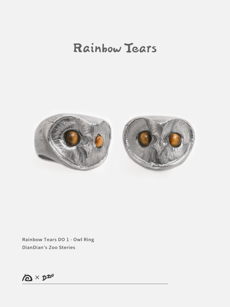 Front and 45-degree view of a sterling silver owl ring with tiger's eye stones