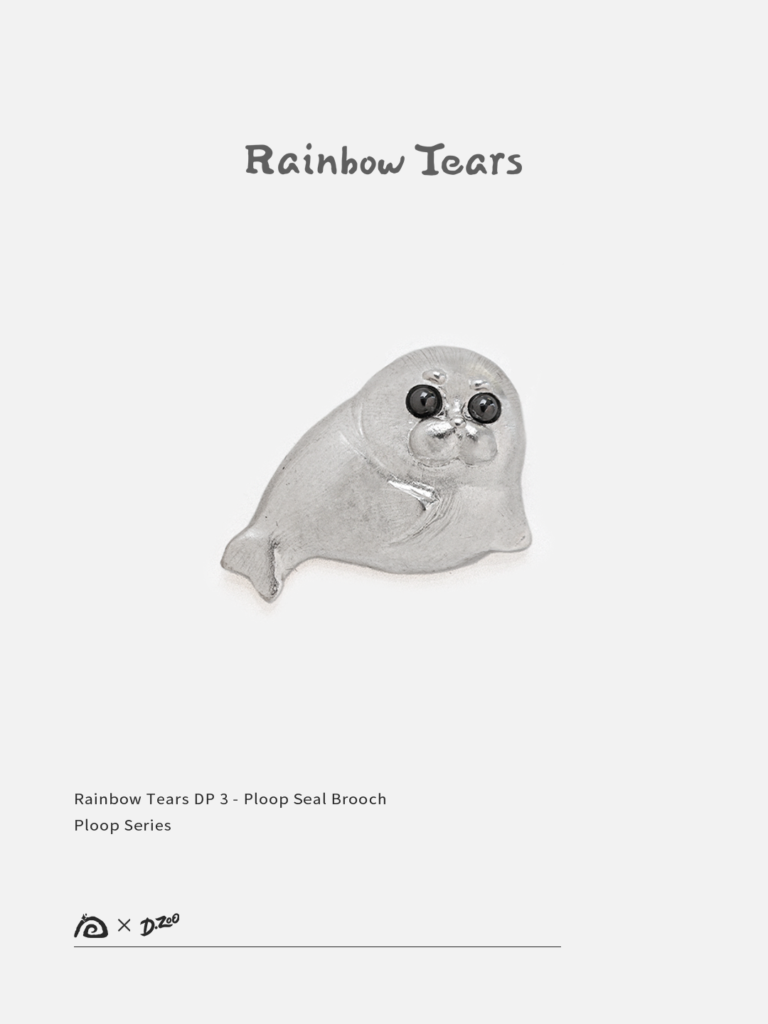 Front view of the Ploop seal brooch in sterling silver on a white background