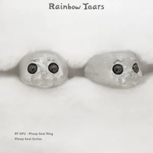 Front and 45-degree angle display of the pure silver Ploop seal ring placed on a white blanket