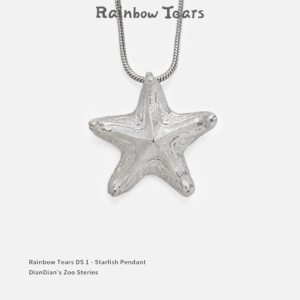 Front view of a bright handcrafted silver starfish pendant on a white background