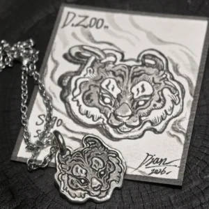 Bespoke tiger head pendant crafted in 990 fine silver, paired with an exquisite hand-illustrated jewelry collector card.