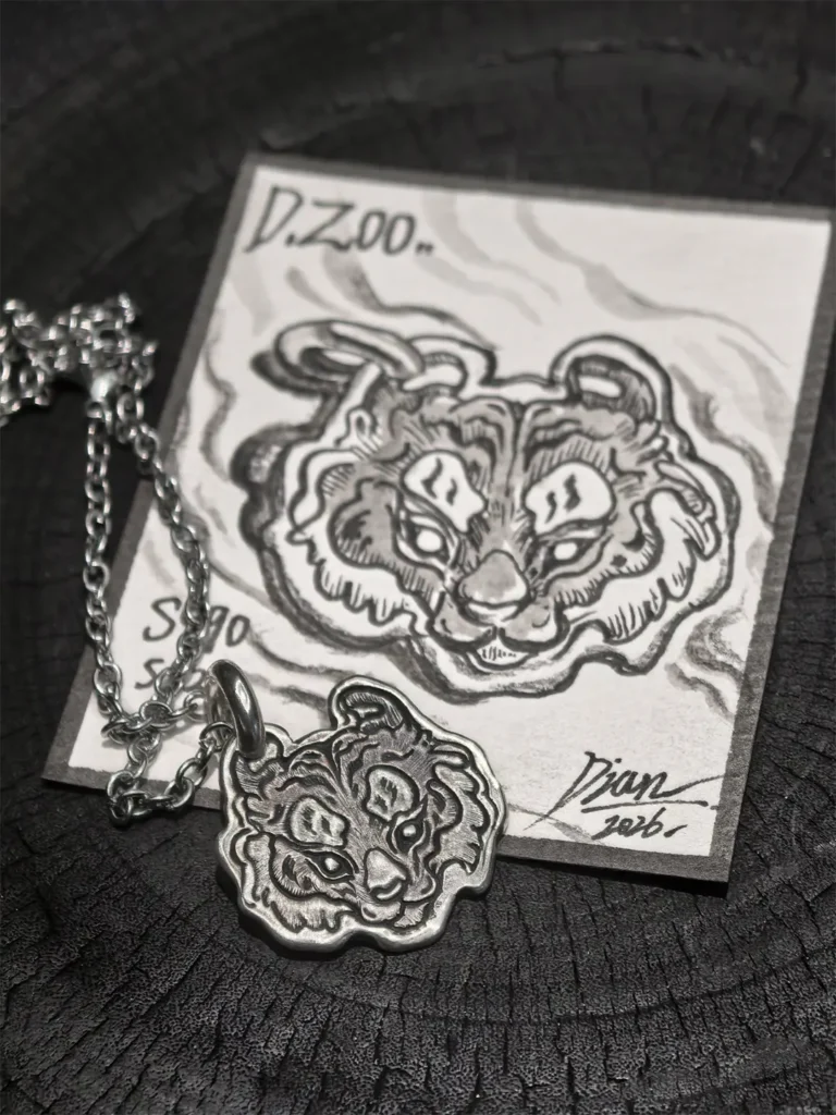 Bespoke tiger head pendant crafted in 990 fine silver, paired with an exquisite hand-illustrated jewelry collector card.