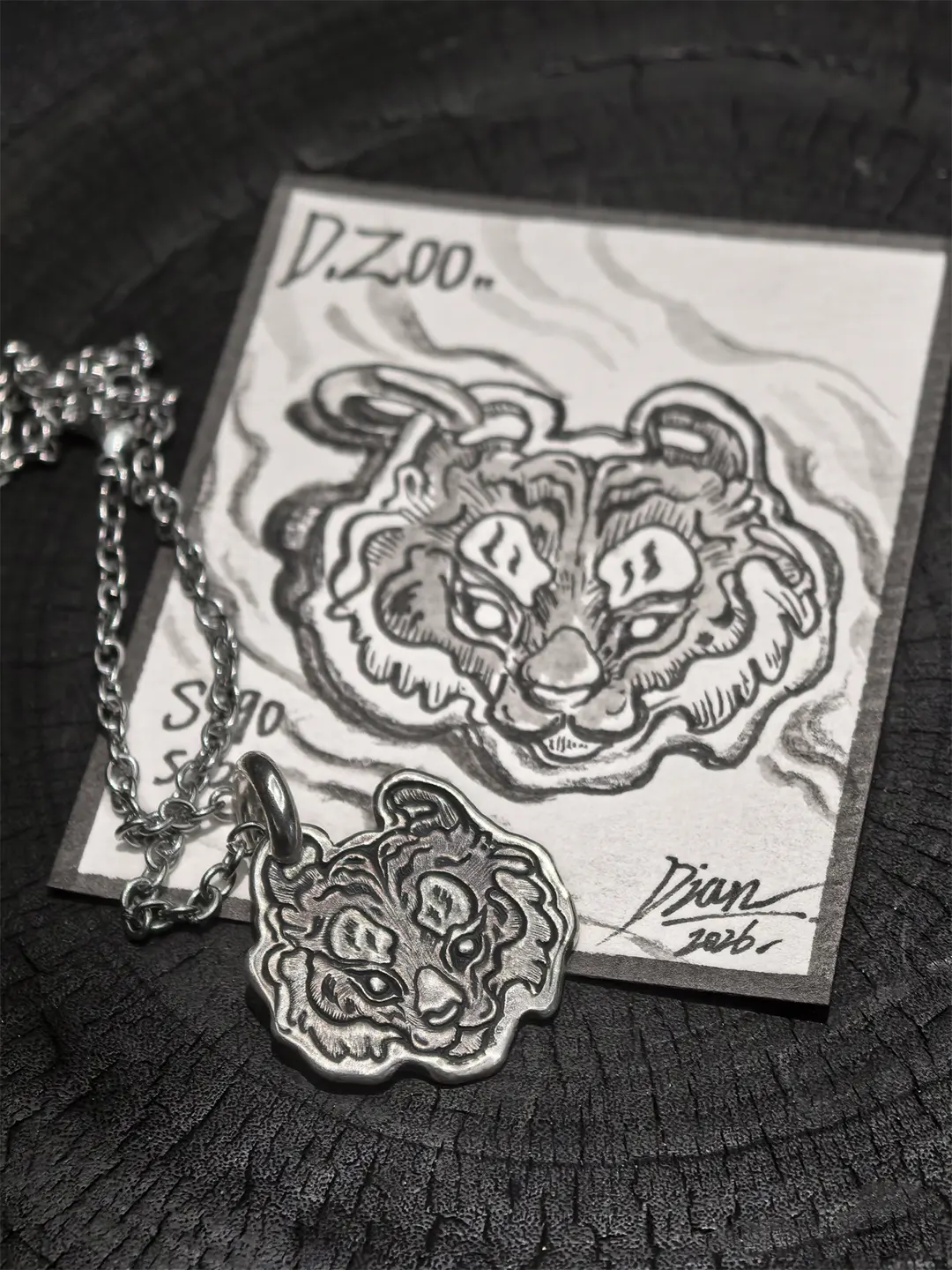 Bespoke tiger head pendant crafted in 990 fine silver, paired with an exquisite hand-illustrated jewelry collector card.