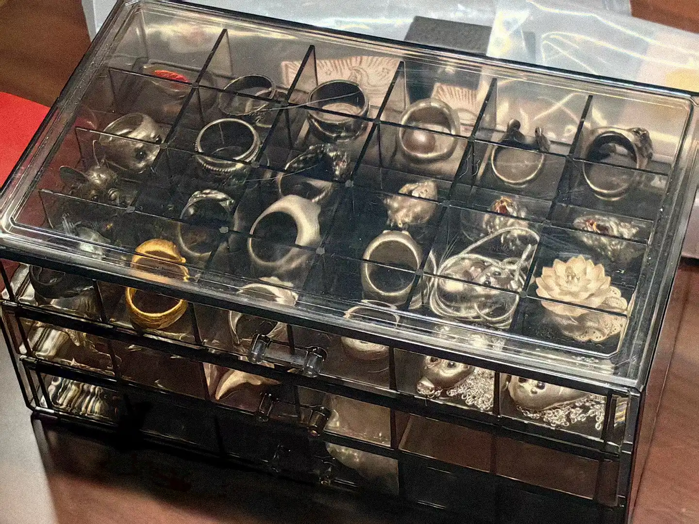Dian Dian's storage box filled with silver animal jewelry