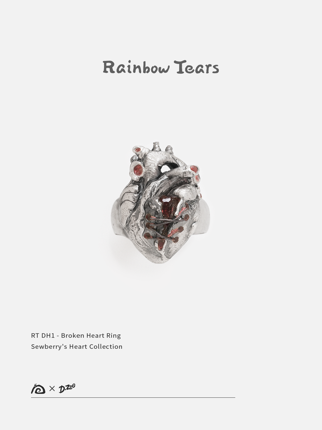 Front view of a sterling broken silver heart ring set with red zircon on a white background