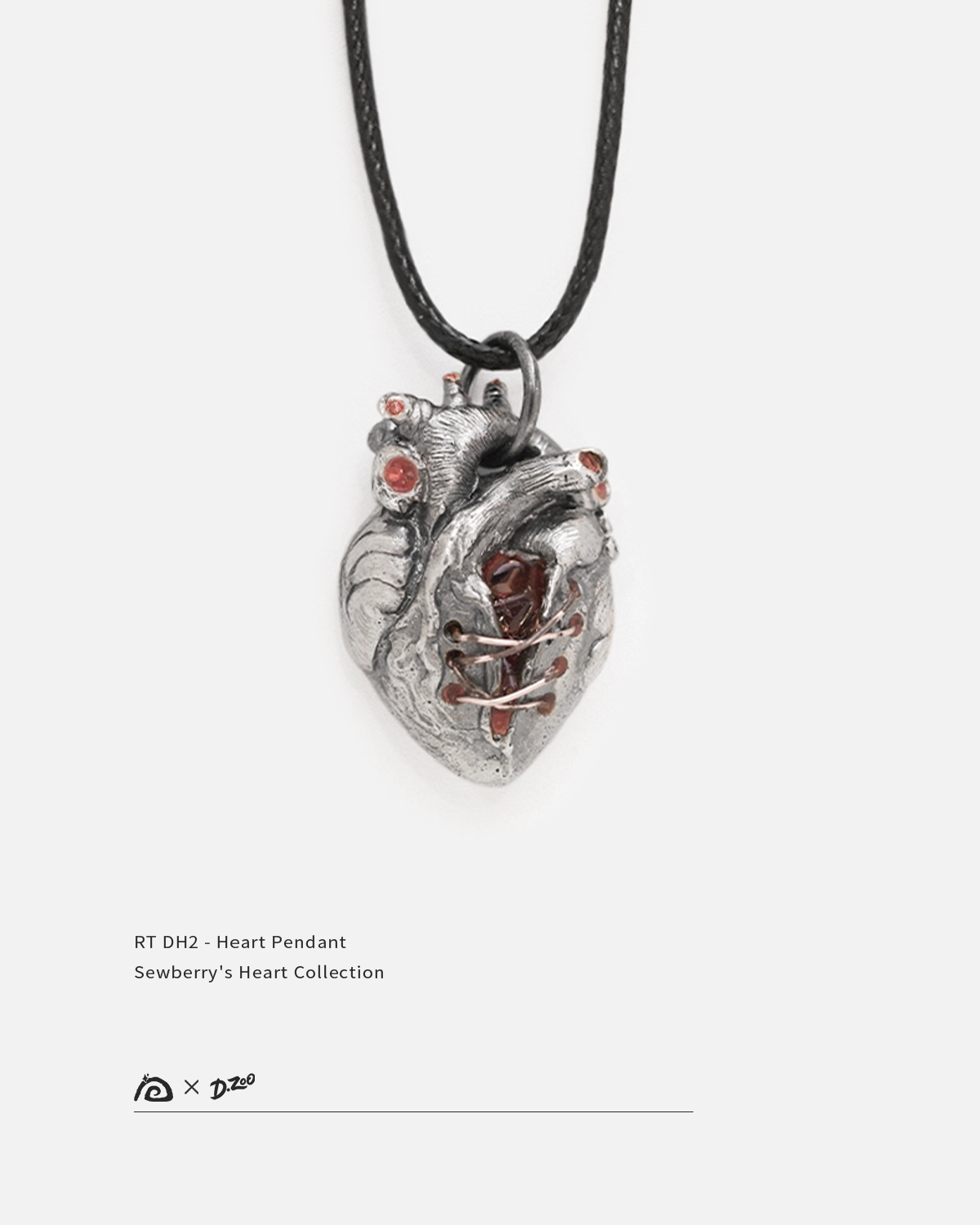 Front view of a broken heart pendant made of 925 sterling silver on a white background