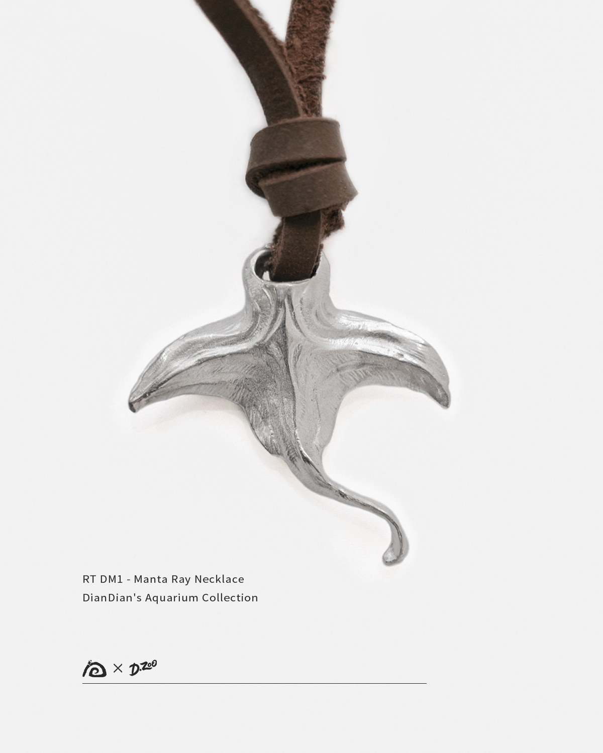 Front view of a 925 silver manta ray necklace on a white background