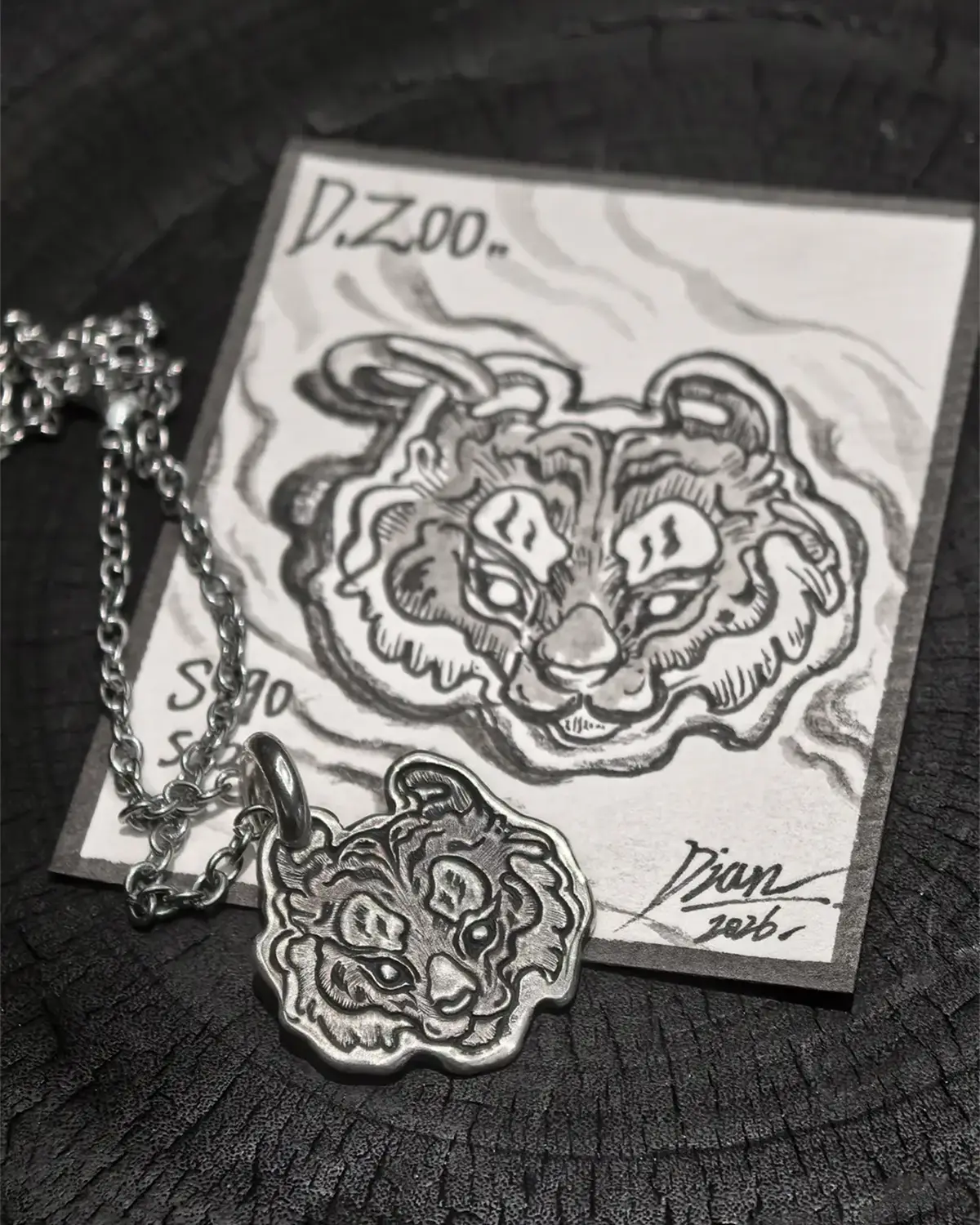 Bespoke tiger head pendant crafted in 990 fine silver, paired with an exquisite hand-illustrated jewelry collector card.