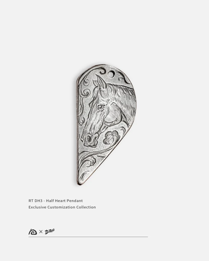 Custom pattern engraved on a single half heart pendant for couples made of 990 fine silver